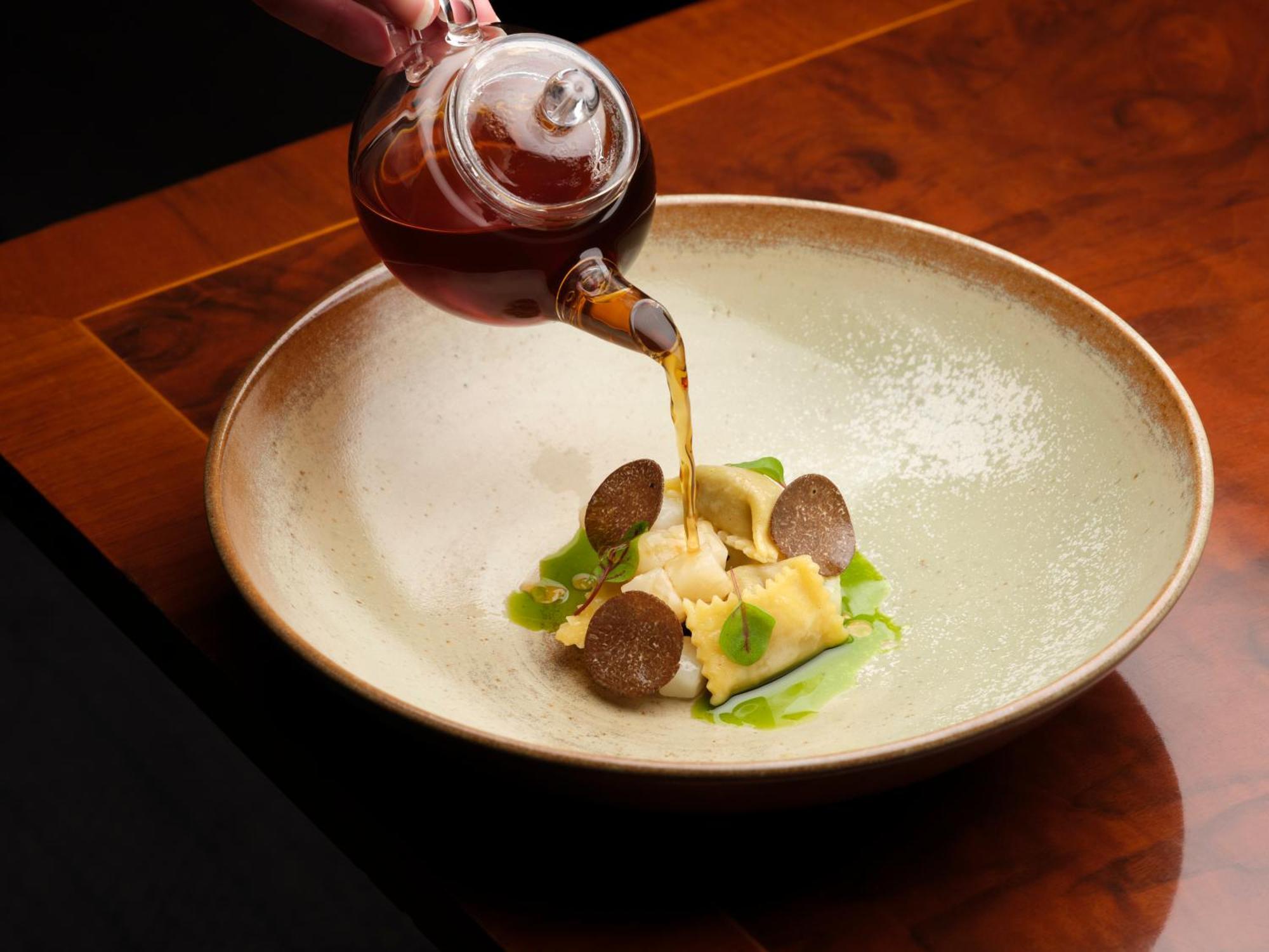 The Stafford London Hotel Exterior photo Soy sauce being poured onto a dish